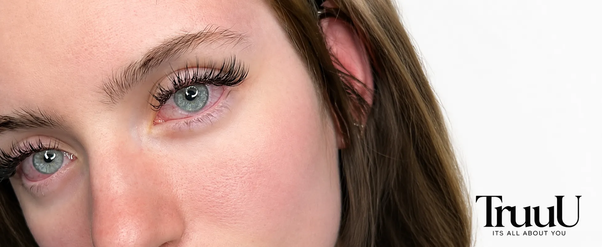 Beautiful woman with long voluminous lashes